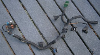 Wr3X00InjWire1b.jpg (870.62 KiB) Viewed 3643 times Six F/I connectors, one 2-pin ECT connector, one MAP sensor connector,<br />a 10-pin harness connector, and the white 2-pin harness connector for the ECT wires. Could use a good bath.