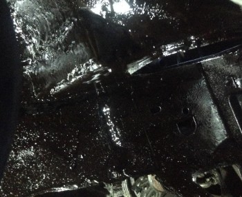 95Z Batt6a.jpg (329.64 KiB) Viewed 10725 times Hard to see anything in this shot. The undercoating really sealed everything up though. It was hard making myself stick to just stitch-welding the new corner in, but it is better that way. There is a lot of overlap here too, on both sides of the cut.